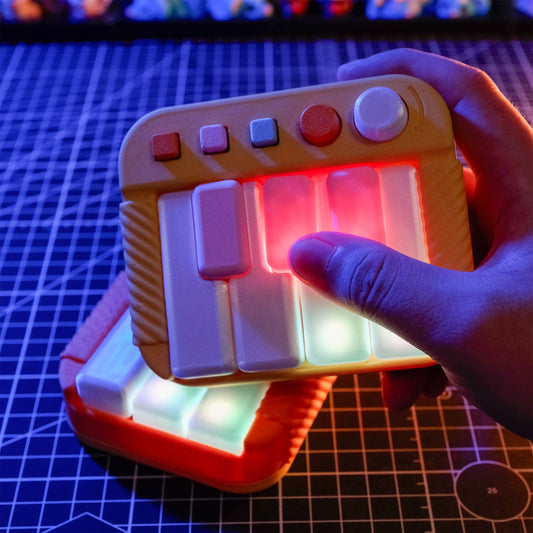 Studio Piano Clicker - Pocket series (Light-Up Keys) - Light Pink with Yellow and Blue - 3 Black Keys default